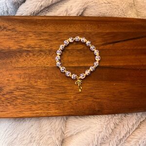 Elegant Purple Beaded Bracelet with Gold Charm